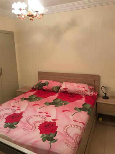 Кровать или кровати в номере Appartamento per famiglia con mare e acquapark di frontecasa
