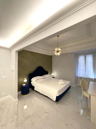 Ένα ή περισσότερα κρεβάτια σε δωμάτιο στο Casa Balzola - Suite Astra