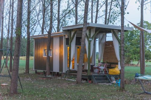 a tiny house in the middle of the woods at Drina River Glamping in Loznica