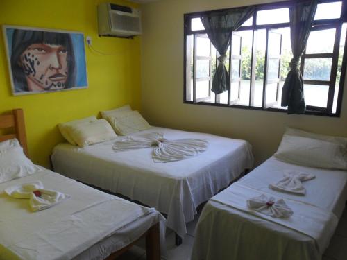 Cama o camas de una habitación en Hotel Beira Rio Preguiças