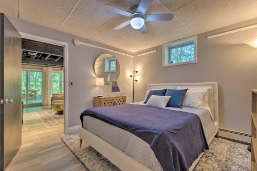 A bed or beds in a room at Unique Southampton Getaway with Rooftop Deck!