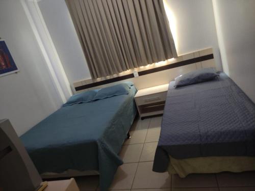 Кровать или кровати в номере Apart no Águas da Serra - 115B