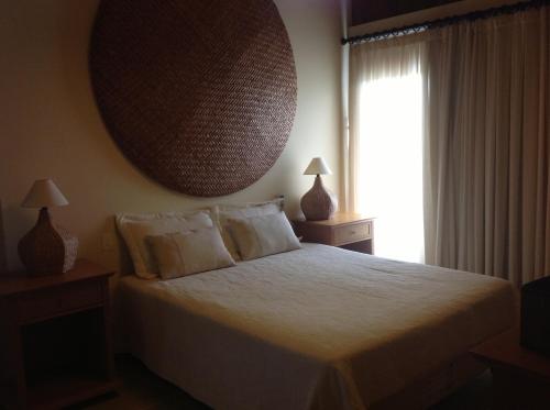 מיטה או מיטות בחדר ב-Pipa Hills Casa Bromélia