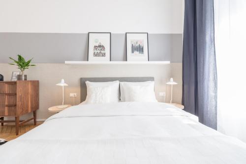 Posteľ alebo postele v izbe v ubytovaní Venus Apartments - Opera I