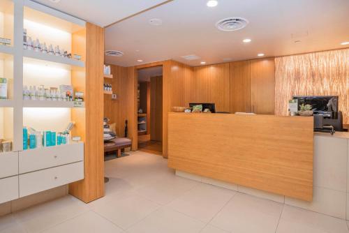 a pharmacy with a counter in a room at The Sutton Place Hotel Vancouver in Vancouver