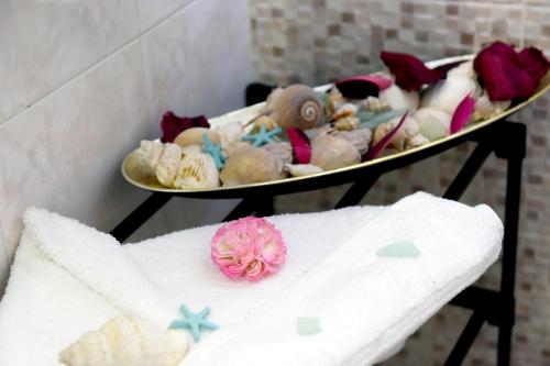 a tray of stuffed animals on a table with a towel at Palm Square Appart in Ialyssos