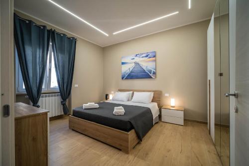 Postel nebo postele na pokoji v ubytování Fix You Apartment Fco