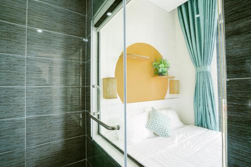Kylpyhuone majoituspaikassa Mộc Homestay GrandWorld Phú Quốc
