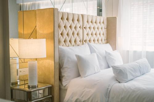 Posteľ alebo postele v izbe v ubytovaní Ibrahim Boutique Hotel