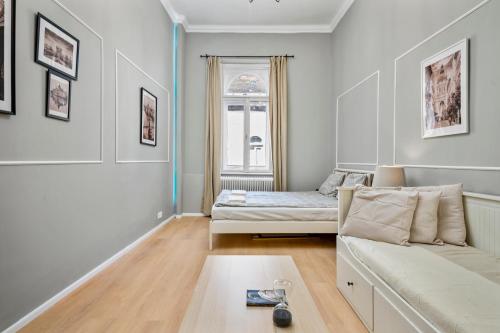 A bed or beds in a room at Venus Apartments - Akacfa I