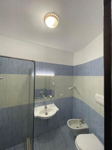 Koupelna v ubytování Hotel Zverneci