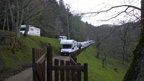 a group of camper vans parked on a hill at Camping Camaldoli in Camaldoli