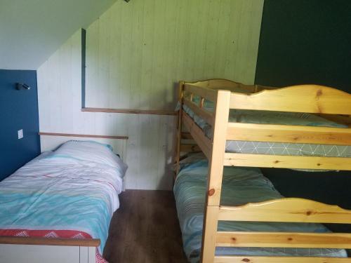 Katil atau katil-katil dalam bilik di Gîte Le Passage 133