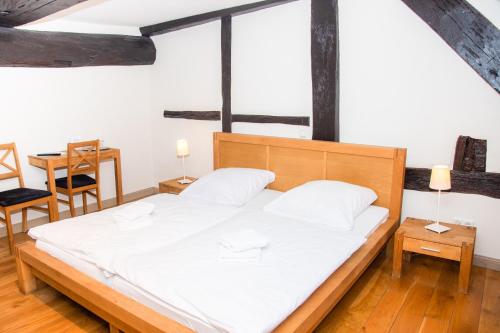 Katil atau katil-katil dalam bilik di Alte Windmühle - Hotel Garni