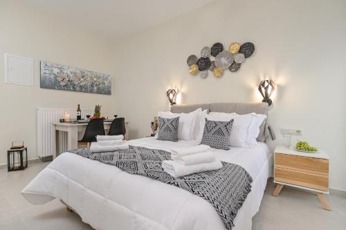 Postel nebo postele na pokoji v ubytování Hermes Luxury Studio Apartment - Naxos Center