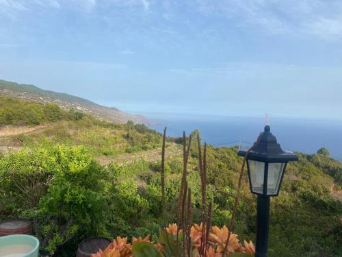 a street light and a view of the ocean at Casa Nieves de Mario in Santa Cruz de la Palma