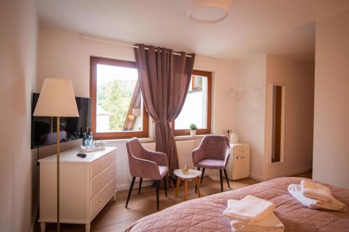 Postel nebo postele na pokoji v ubytování ApartOne Land-Hotel