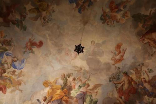 a painting on the ceiling of a church at Hotel Burchianti in Florence