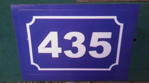 a blue sign with the number on it at Studio L'audrerie. in Saint-Pardoux-Corbier
