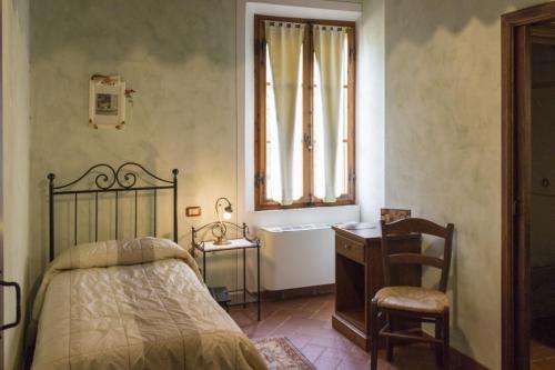 Posteľ alebo postele v izbe v ubytovaní Piccolo Hotel San Valentino