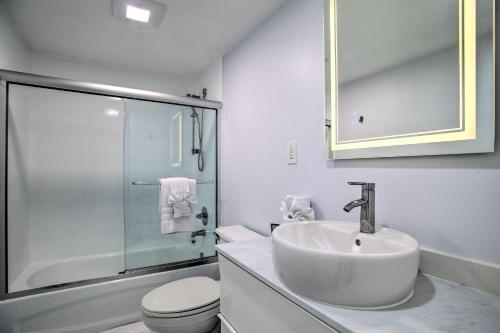 a bathroom with a sink and a toilet and a shower at Less Than Half-Mi to Beach Sunny Isles Resort Condo in Miami Beach