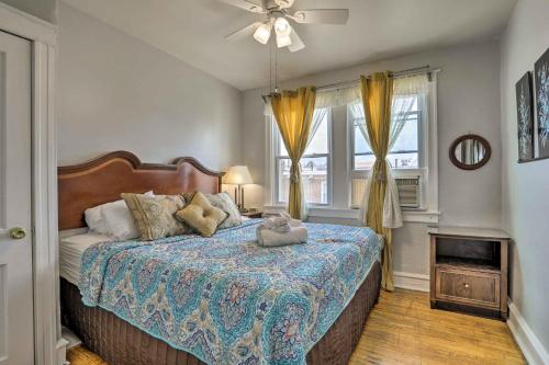 a bedroom with a bed with a teddy bear on it at South Philly Townhome 3 Mi to Center City in Philadelphia