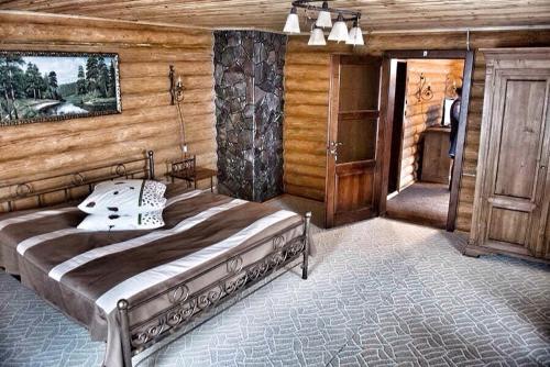 Ένα ή περισσότερα κρεβάτια σε δωμάτιο στο Lisova Kazka