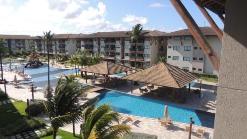 an aerial view of a hotel with a swimming pool at La Fleur Polinésia Muro Alto in Porto De Galinhas