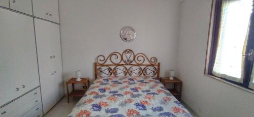 Postel nebo postele na pokoji v ubytování Casa Pomelia