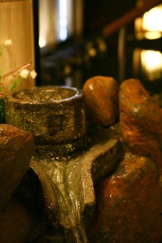 a pile of rocks sitting on top of a table at Dormy Inn Hakata Gion in Fukuoka