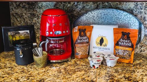 a red coffee maker sitting on top of a counter at Red Tail Ranch in Groveland