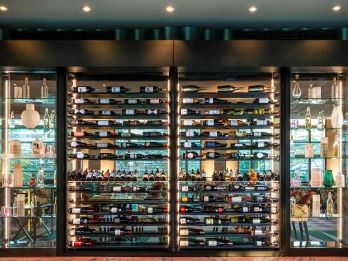 a wine cellar with a lot of wine bottles at Sofitel Luxembourg Europe in Luxembourg