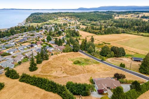 an aerial view of a small town with houses and trees at Arrowhead Way in Utsalady