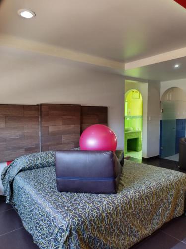 Postel nebo postele na pokoji v ubytování Hotel & Villas 7