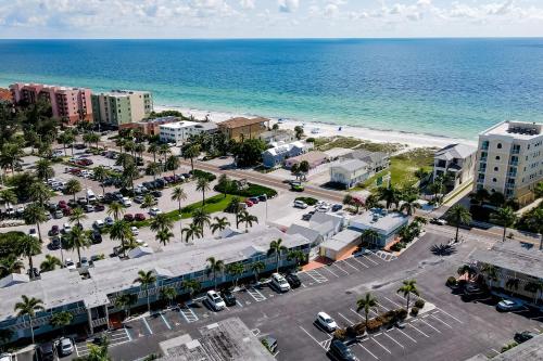 an aerial view of a city with the beach at Barefoot Beach Resort F104 in Clearwater Beach