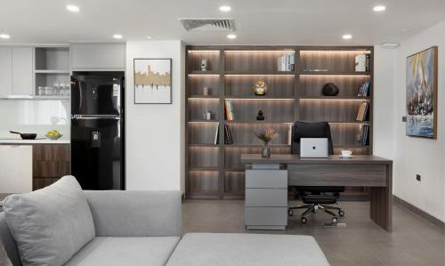 an office with a desk and a computer in a kitchen at Flower Garden Hotel in Hanoi