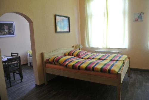 Кровать или кровати в номере Pension Valeria