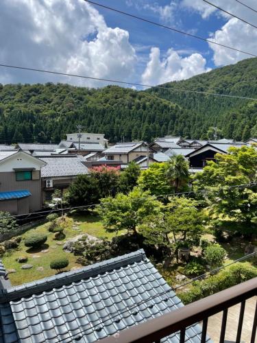 a view from the balcony of a town with houses at 川端屋　kawabataya in Minamiechizen
