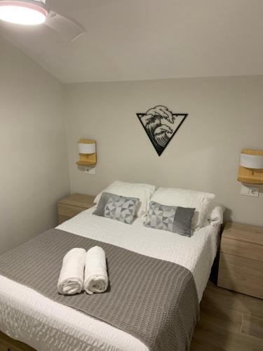 Postel nebo postele na pokoji v ubytování Golden Mile Apartment