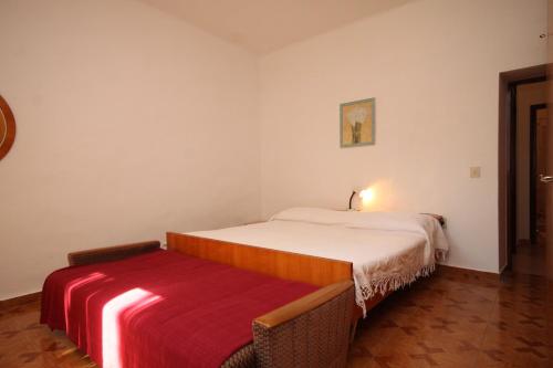 Postel nebo postele na pokoji v ubytování Apartment Basanija 7149c