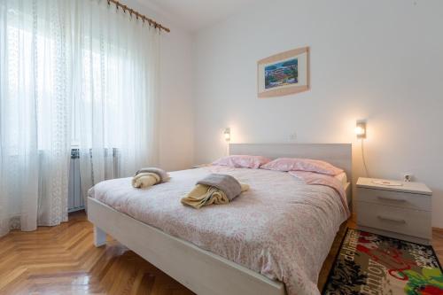 Ένα ή περισσότερα κρεβάτια σε δωμάτιο στο Apartments with parking space Kukci, Porec - 7166