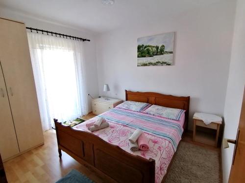 Ένα ή περισσότερα κρεβάτια σε δωμάτιο στο Apartman Čanaki Splitska