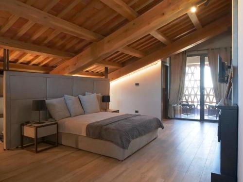 Ένα ή περισσότερα κρεβάτια σε δωμάτιο στο Relais Colle Messino Briaglia Mondovì