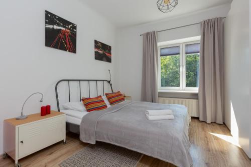 Posteľ alebo postele v izbe v ubytovaní Apartment Bialobrzeska Warsaw by Noclegi Renters