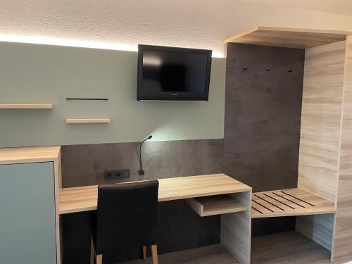 Kuchyň nebo kuchyňský kout v ubytování Hotel Corsten