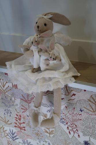 two stuffed animals are sitting on a table at Le Sophora in Chéu