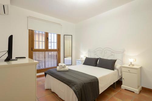 Posteľ alebo postele v izbe v ubytovaní Apartamento Concepción Granada Centro