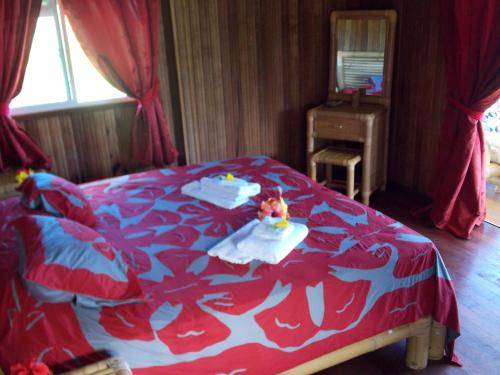 Cama o camas de una habitación en Pension Vaimano-Raivavae