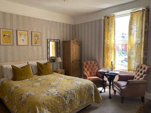 Llit o llits en una habitació de The Snowdonia Apartments