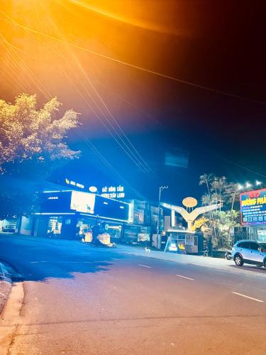 a view of a city street with a gas station at D'Villa Hotel - Homestay in Kon Tum